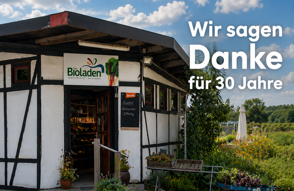 KI generiert: Ein Bioladen mit Text: „Wir sagen Danke für 30 Jahre“.