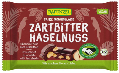 Produktfoto zu Zartbitter Schokolade 60% Kakao mit Haselnüssen vegan fair